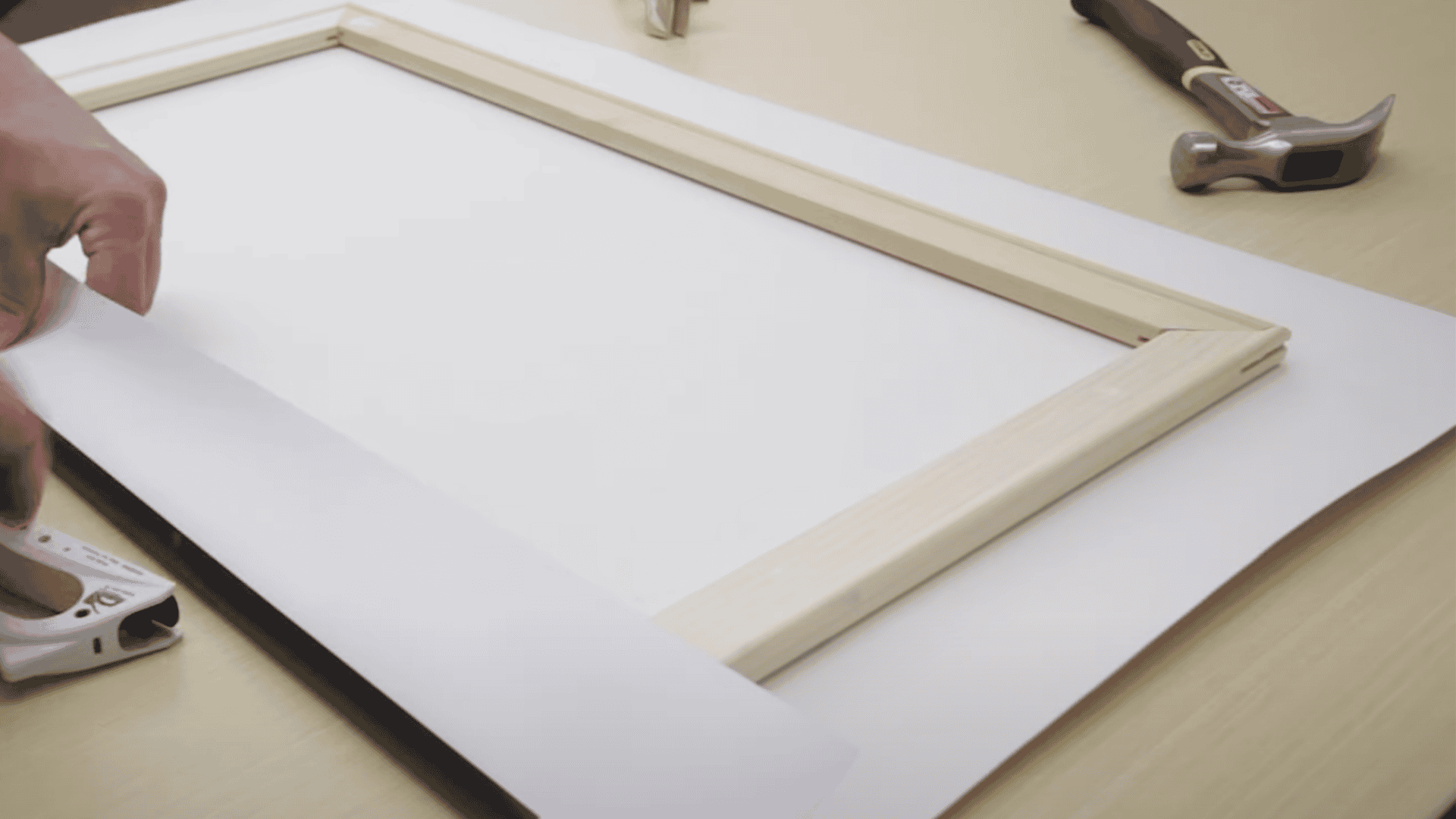 Position the Frame and Secure the First Staples